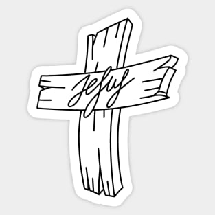 A wooden cross with the inscription Jesus Sticker